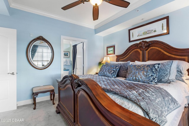 carpeted bedroom featuring ceiling fan and ornamental molding