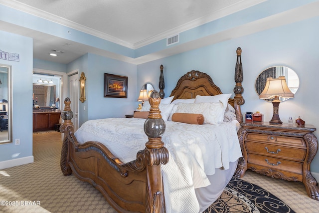 bedroom with ensuite bath, light colored carpet, and ornamental molding