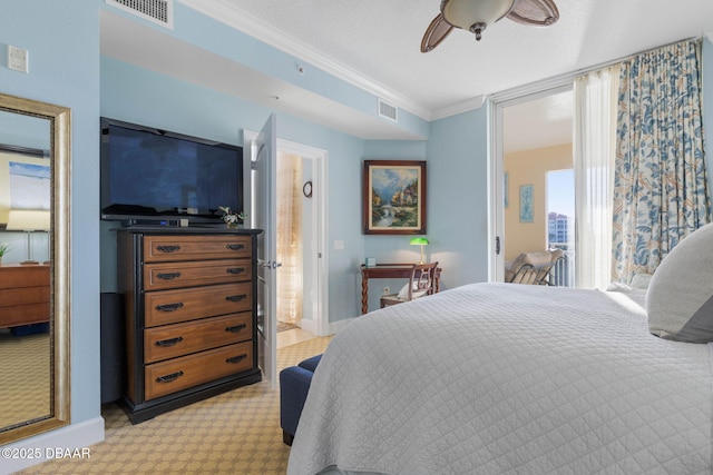 bedroom with baseboards, visible vents, a ceiling fan, and ornamental molding