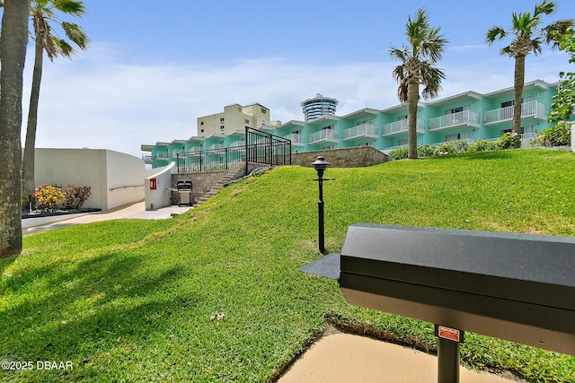 surrounding community with a yard