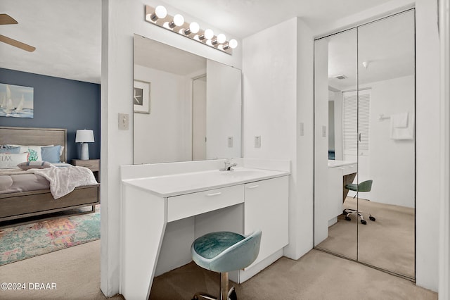 bathroom featuring vanity and ceiling fan