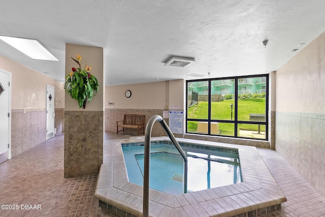 view of swimming pool featuring a swimming pool