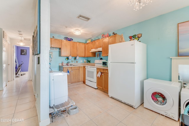 kitchen with light brown cabinetry, a notable chandelier, light tile patterned floors, and white appliances