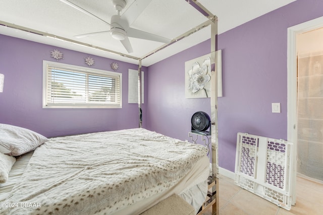 bedroom featuring ceiling fan and light tile patterned floors