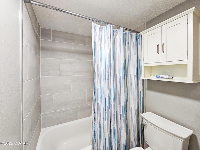 bathroom with shower / bath combination with curtain, a textured ceiling, and toilet
