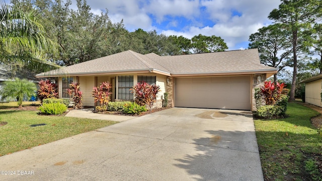 ranch-style house featuring an attached garage, brick siding, a shingled roof, driveway, and a front lawn