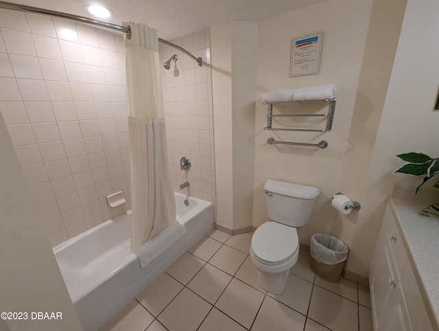 full bathroom with shower / bath combo, toilet, vanity, and tile patterned floors