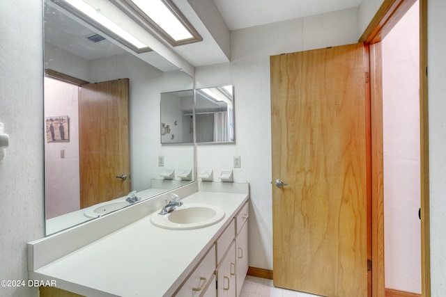 bathroom featuring vanity