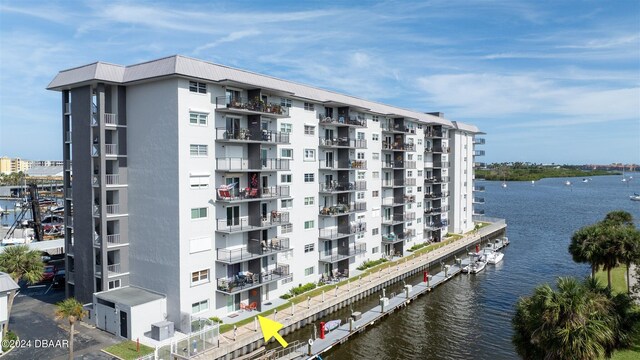 view of property with a water view