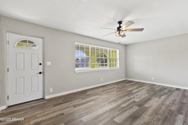 2711 Dach Ave, Daytona Beach, FL 32118 - entrance foyer featuring ceiling fan, wood finished floors, and baseboards
