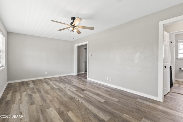 2711 Dach Ave, Daytona Beach, FL 32118 - spare room featuring ceiling fan, wood finished floors, and baseboards