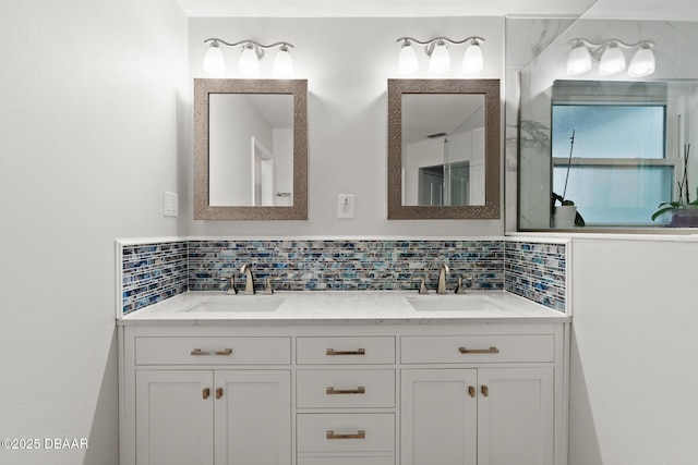 bathroom featuring decorative backsplash and vanity