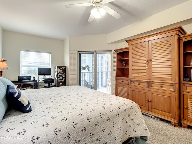 carpeted bedroom with access to outside, multiple windows, and ceiling fan