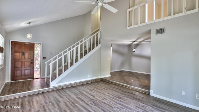 201 Pine Cone Trl, Ormond Beach, FL 32174 - entryway featuring stairs, visible vents, wood finished floors, and baseboards