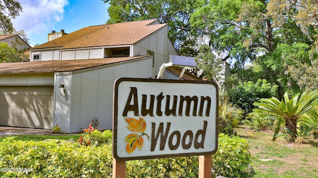 201 Pine Cone Trl, Ormond Beach, FL 32174 - community sign with a garage
