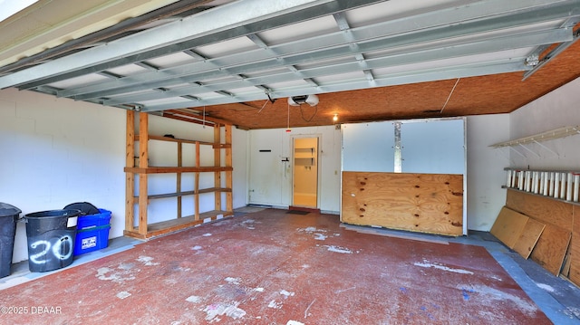 201 Pine Cone Trl, Ormond Beach, FL 32174 - garage featuring a garage door opener