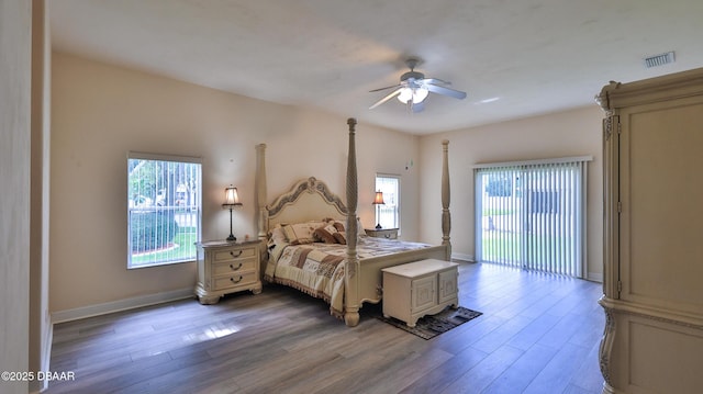 4269 Mayfair Ln, Port Orange, FL 32129 - bedroom featuring wood finished floors, a ceiling fan, and access to outside