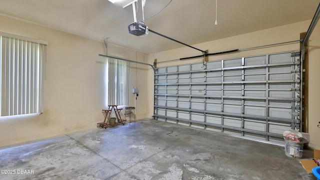 4269 Mayfair Ln, Port Orange, FL 32129 - garage featuring a garage door opener