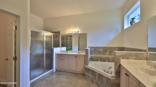 4269 Mayfair Ln, Port Orange, FL 32129 - full bathroom with two vanities, a shower stall, and a bath