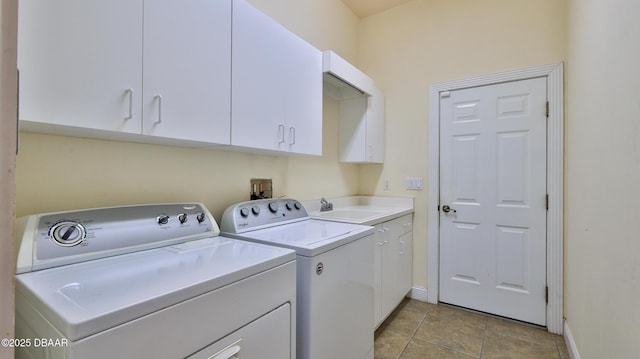 4269 Mayfair Ln, Port Orange, FL 32129 - laundry area featuring separate washer and dryer and cabinet space