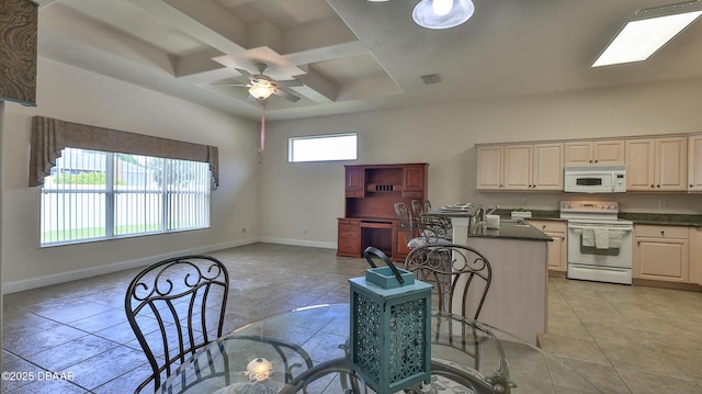 4269 Mayfair Ln, Port Orange, FL 32129 - kitchen with white appliances, coffered ceiling, dark countertops, a ceiling fan, and a breakfast bar