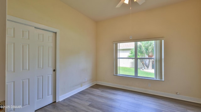 4269 Mayfair Ln, Port Orange, FL 32129 - empty room featuring wood finished floors and ceiling fan