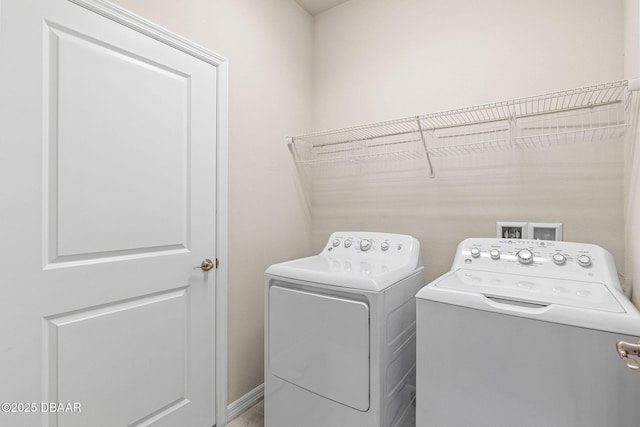 3402 Torre Blvd, New Smyrna Beach, FL 32168 - laundry area with washing machine and dryer
