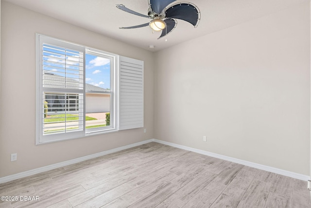 3402 Torre Blvd, New Smyrna Beach, FL 32168 - unfurnished room with light wood-style flooring, plenty of natural light, ceiling fan, and baseboards
