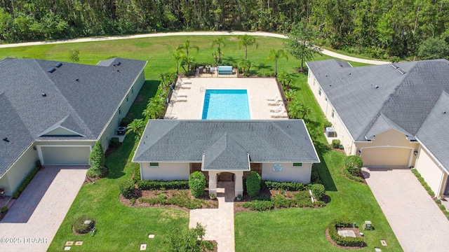 3402 Torre Blvd, New Smyrna Beach, FL 32168 - view from above of property with a pool area