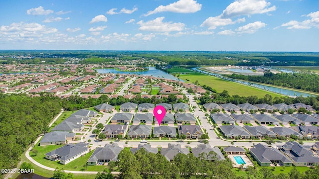 3402 Torre Blvd, New Smyrna Beach, FL 32168 - aerial perspective of suburban area with a large body of water