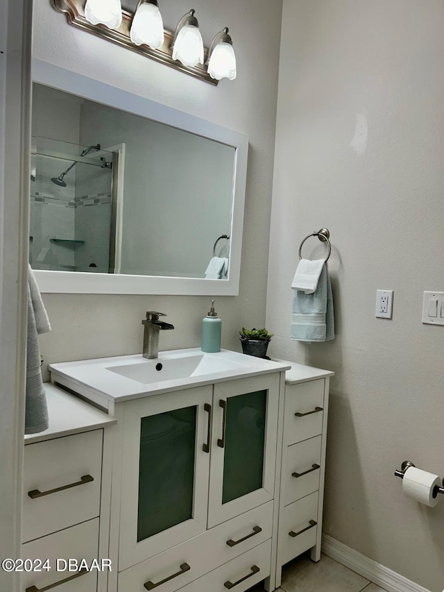 bathroom featuring vanity and walk in shower