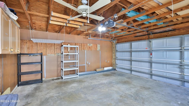 garage featuring a garage door opener and ceiling fan