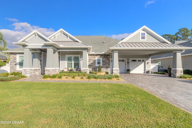 craftsman inspired home with a front lawn