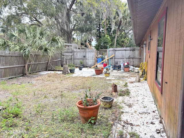 view of yard featuring a fenced backyard