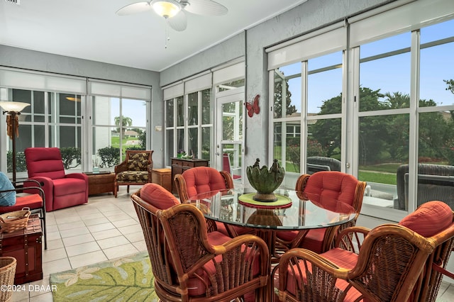 sunroom / solarium with ceiling fan