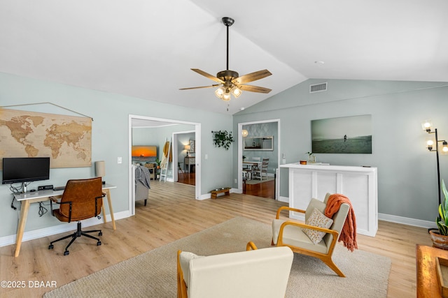 1245 Thomas Dr, Port Orange, FL 32129 - office space with visible vents, wood finished floors, a ceiling fan, and vaulted ceiling