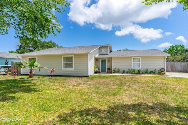 1245 Thomas Dr, Port Orange, FL 32129 - single story home featuring a front yard and fence