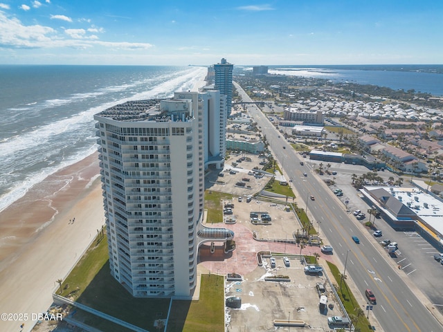 aerial view featuring a water view and a view of the beach