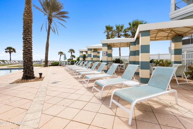 view of patio featuring a community pool