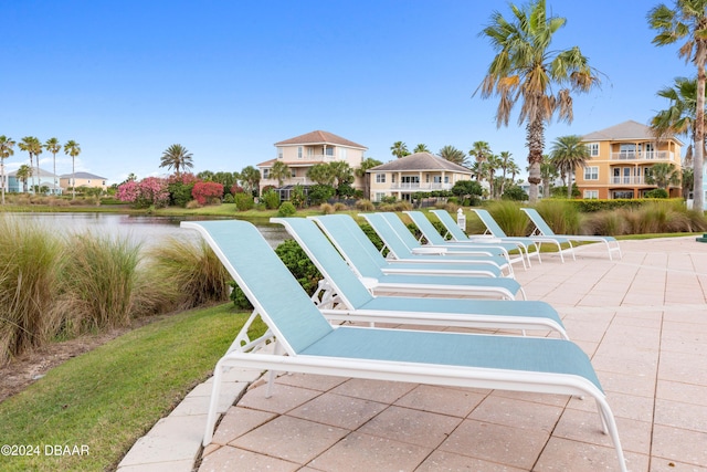 view of patio featuring a water view