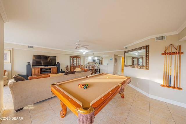 playroom with tile patterned floors, ceiling fan, and crown molding