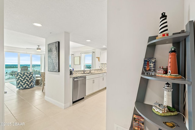 3721 S Atlantic Ave Unit 801, Daytona Beach Shores, FL 32116 - hallway featuring healthy amount of natural light, recessed lighting, and light tile patterned flooring