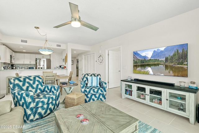3721 S Atlantic Ave Unit 801, Daytona Beach Shores, FL 32116 - living room featuring light tile patterned flooring, ceiling fan, and recessed lighting