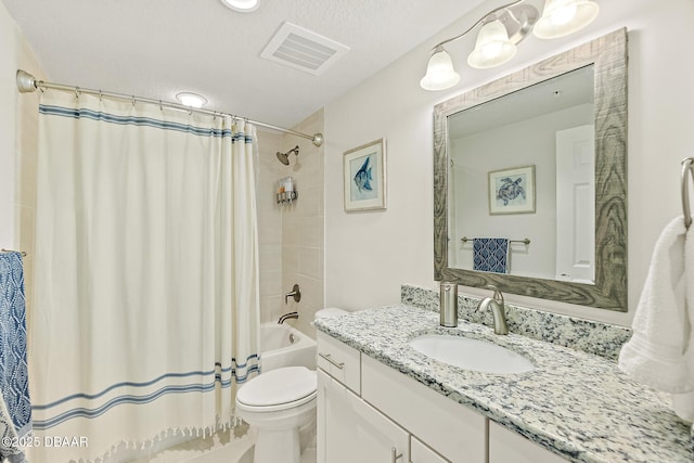 3721 S Atlantic Ave Unit 801, Daytona Beach Shores, FL 32116 - full bathroom with vanity, shower / bath combo with shower curtain, and a textured ceiling