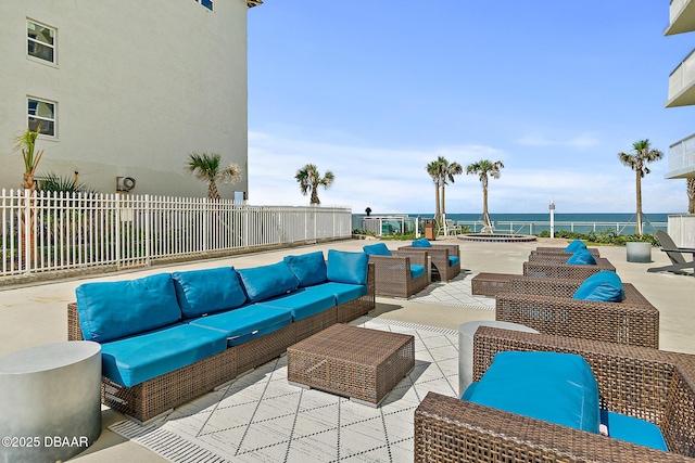 3721 S Atlantic Ave Unit 801, Daytona Beach Shores, FL 32116 - view of patio / terrace featuring outdoor lounge area and a water view