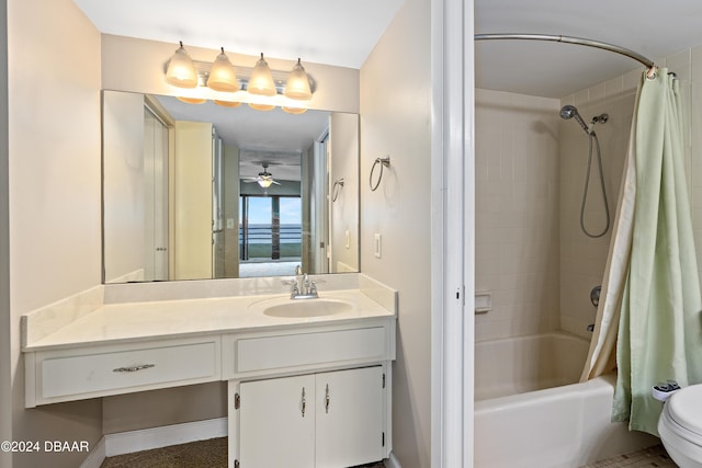 full bathroom with vanity, shower / bath combination with curtain, ceiling fan, and toilet