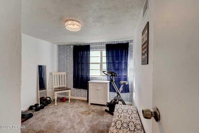 interior space featuring carpet, visible vents, and baseboards