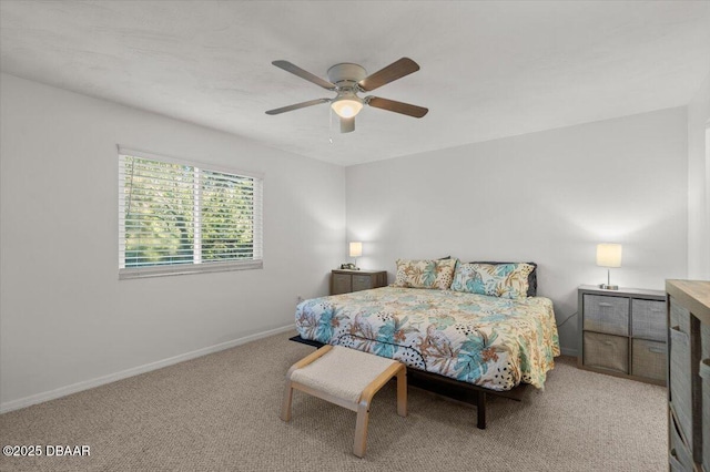 bedroom with light carpet and ceiling fan