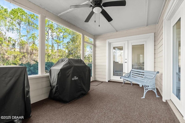 sunroom / solarium with ceiling fan