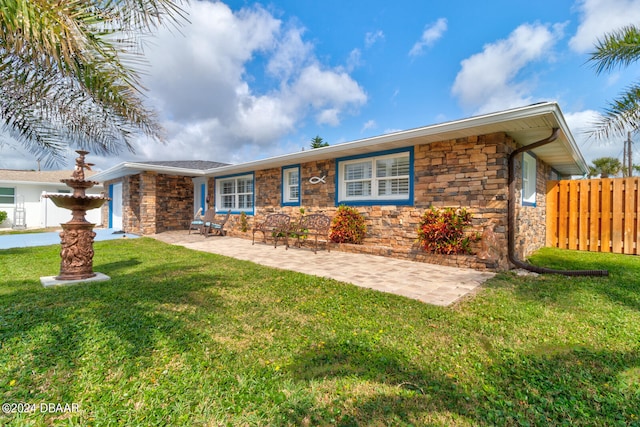 ranch-style house with a front yard